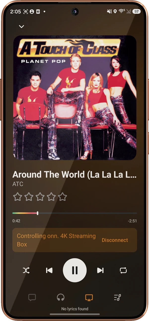 Lagu on an Android phone acting as the remote for a Google TV streaming box: album cover, track title, star rating, and rainbow seek bar, with a banner reading Controlling onn. 4K Streaming Box and a Disconnect button above the transport controls.